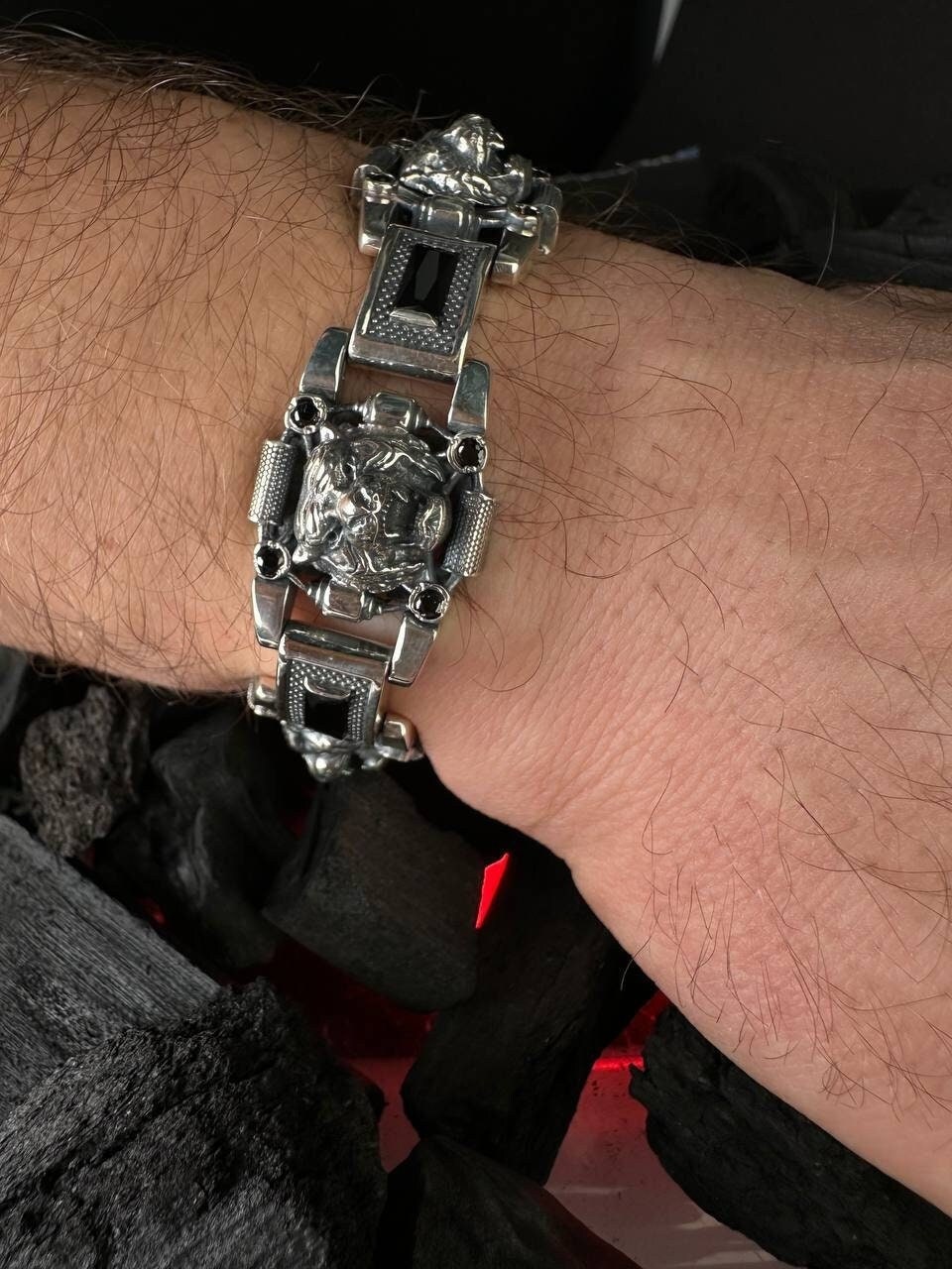 Men's bracelet made of 925 silver with tiger heads on the hand