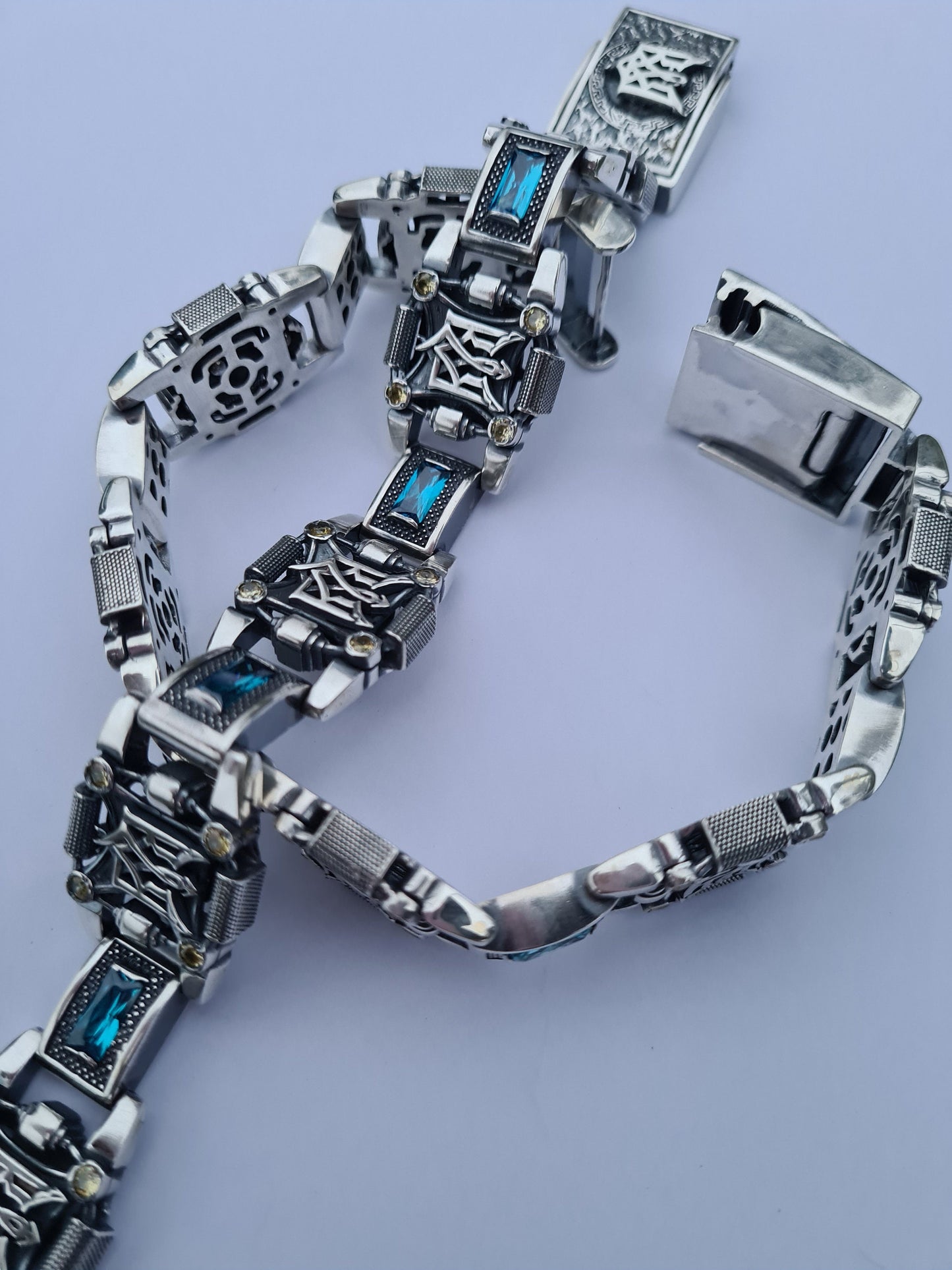 Two bracelets with tridents together