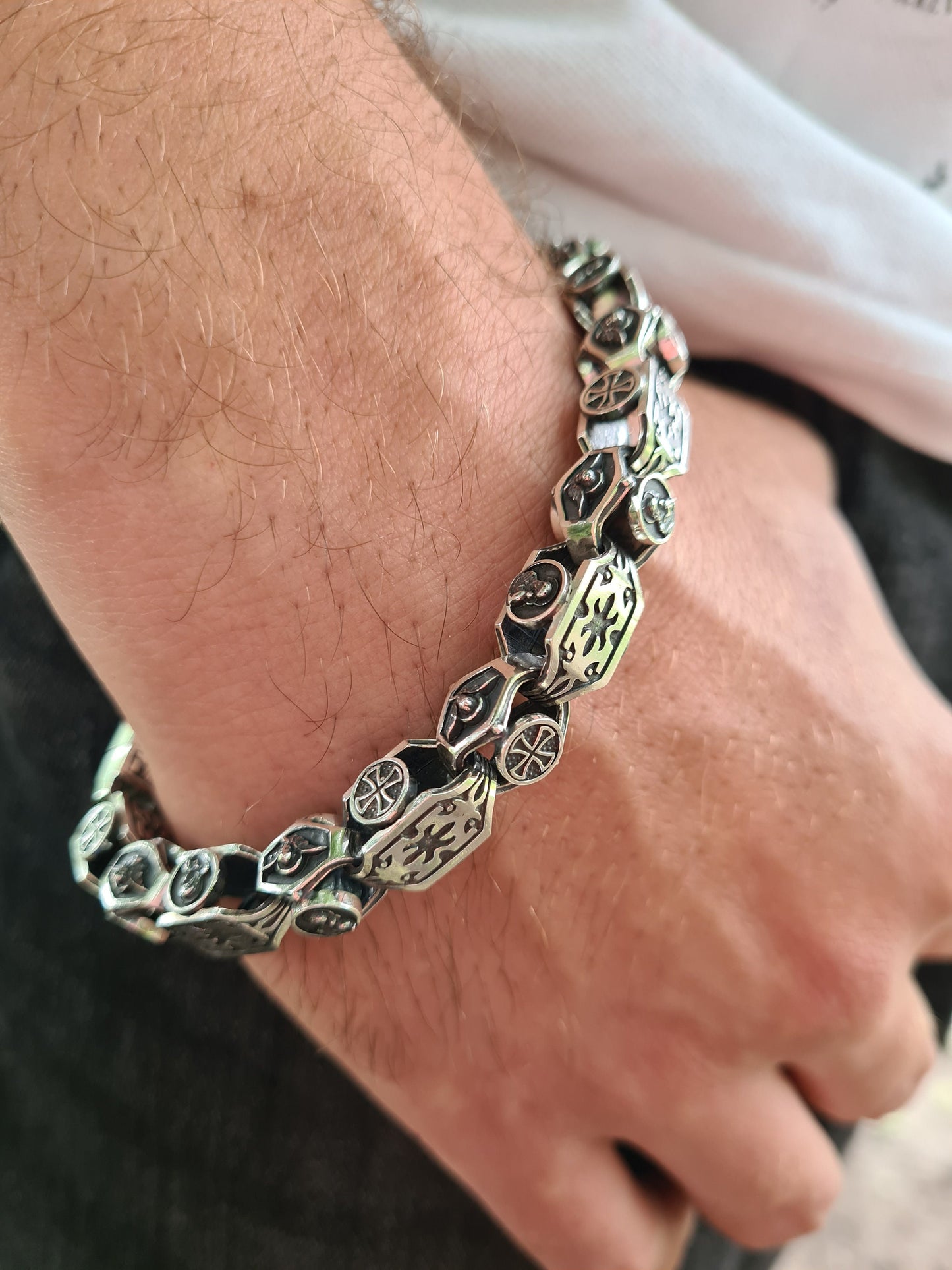 massive bracelet with a sacred symbol handmade