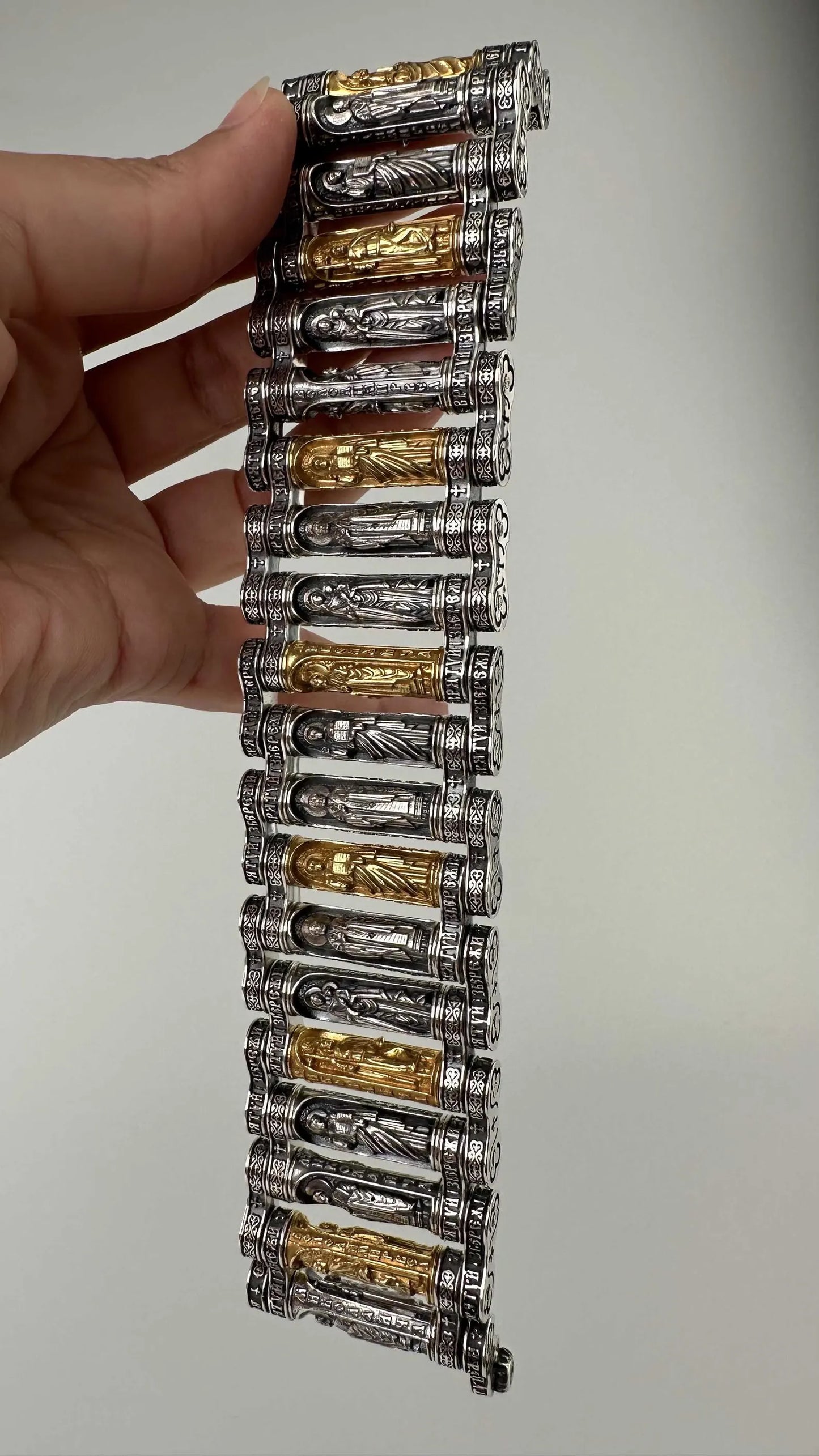 Men's amulet bracelet with gilded inserts and icons