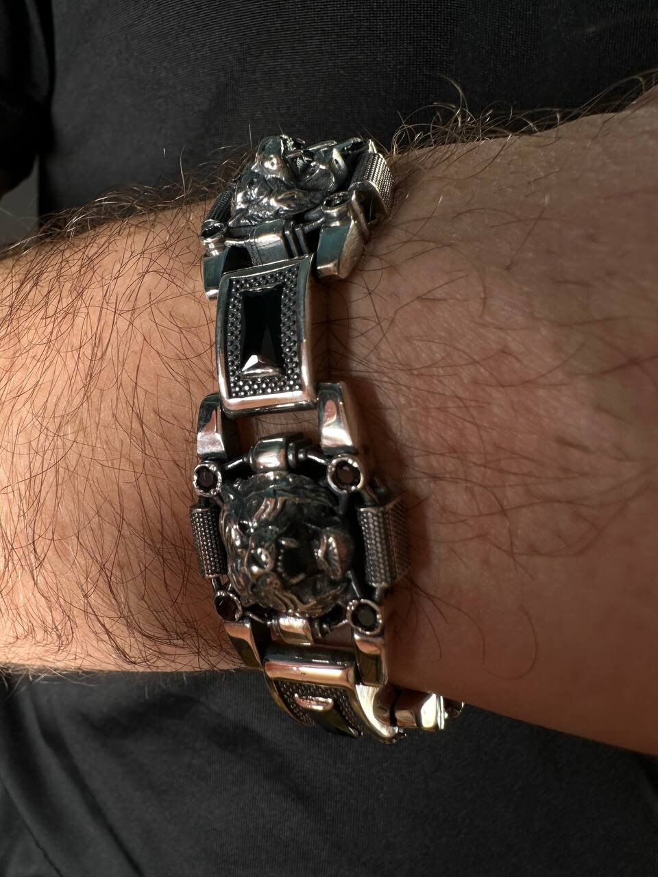 silver bracelet "Tigers" on the hand