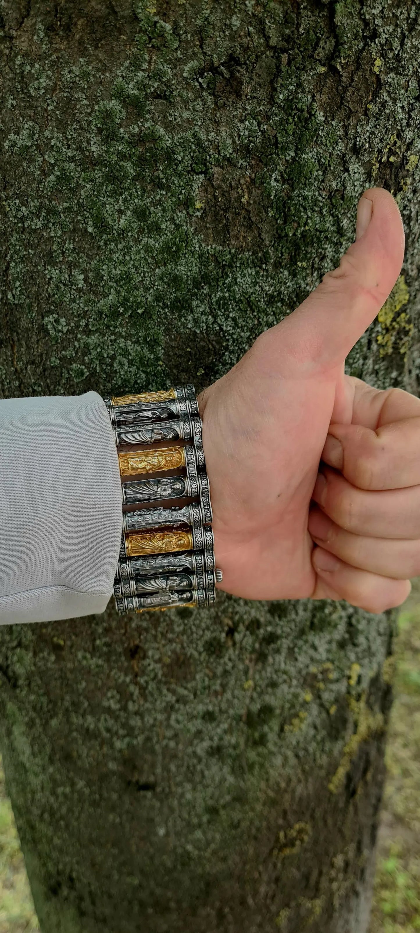 silver bracelet on a man's hand