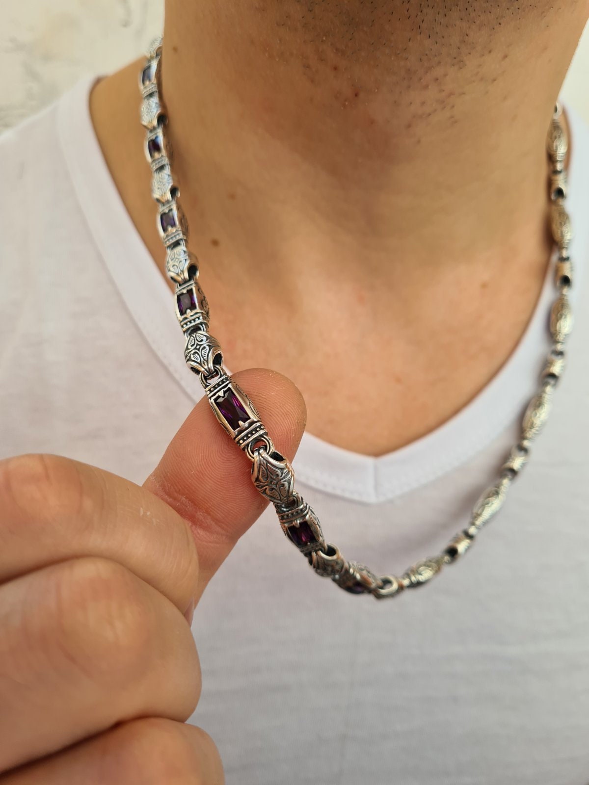 massive decoration with natural garnets and gothic style