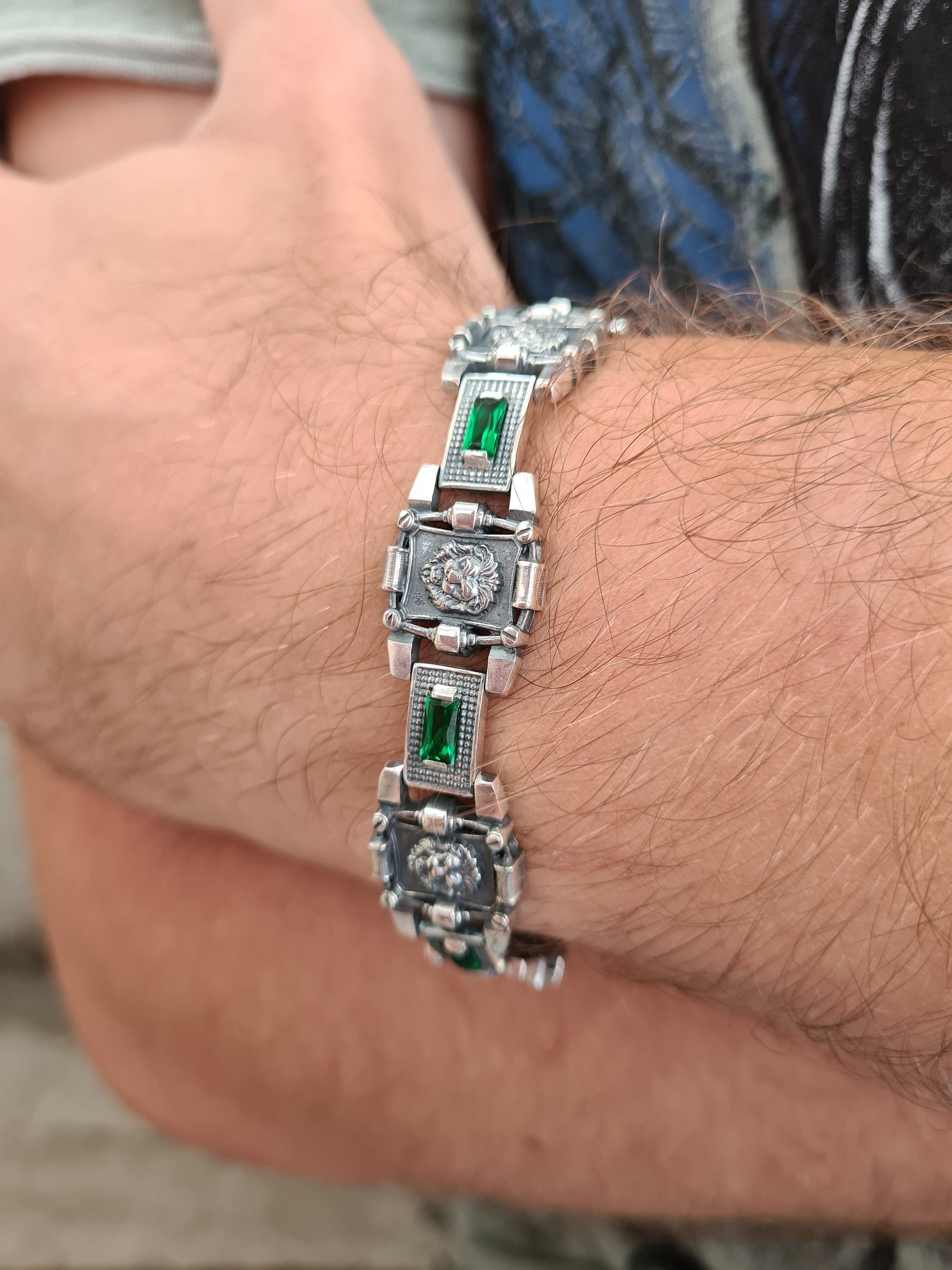Brutal ethnic style accessory with emerald colored stones