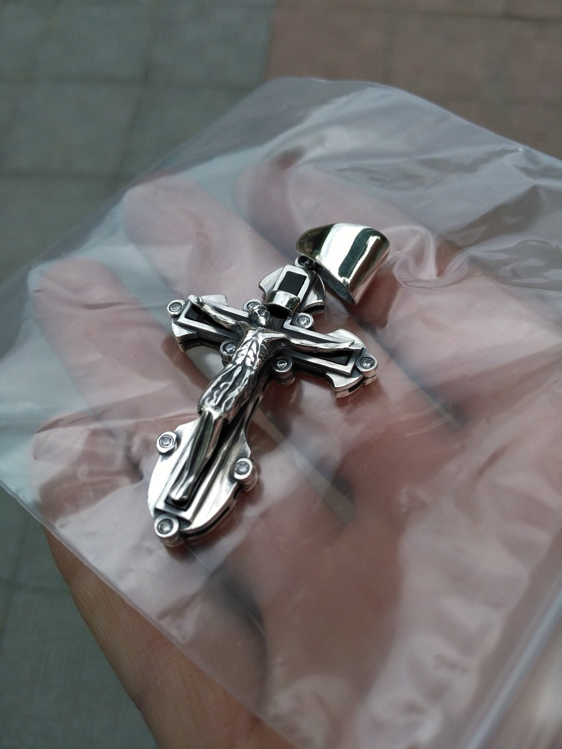 Blackened silver cross with white stones