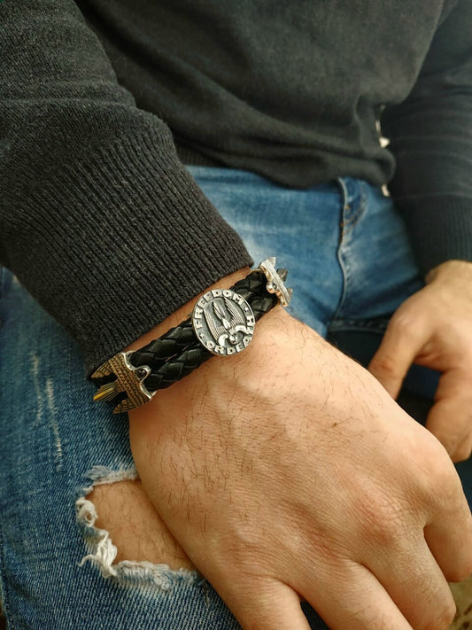 Rebel-style bracelet on male wrist