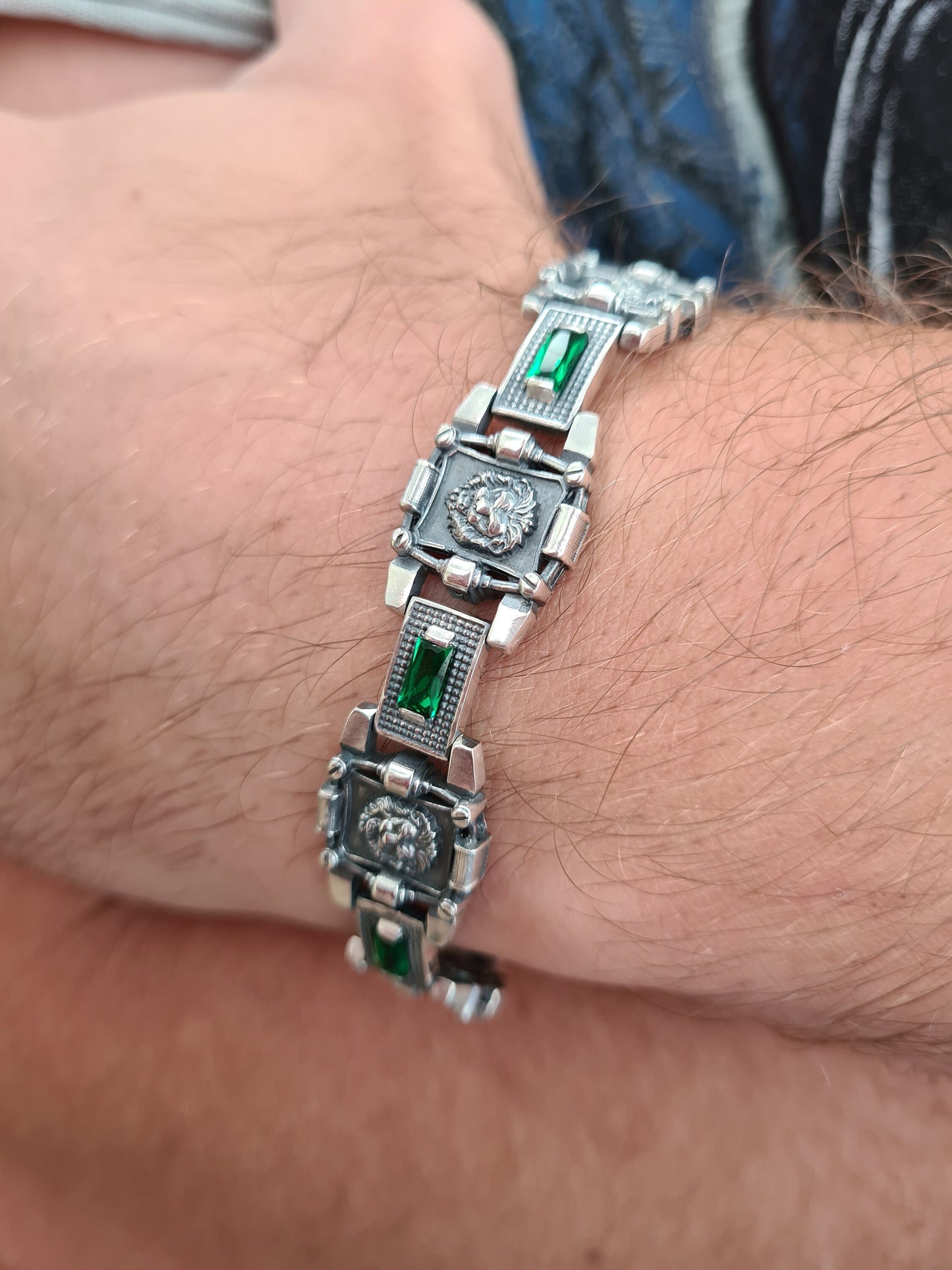 Brutal ethnic style accessory with emerald colored stones