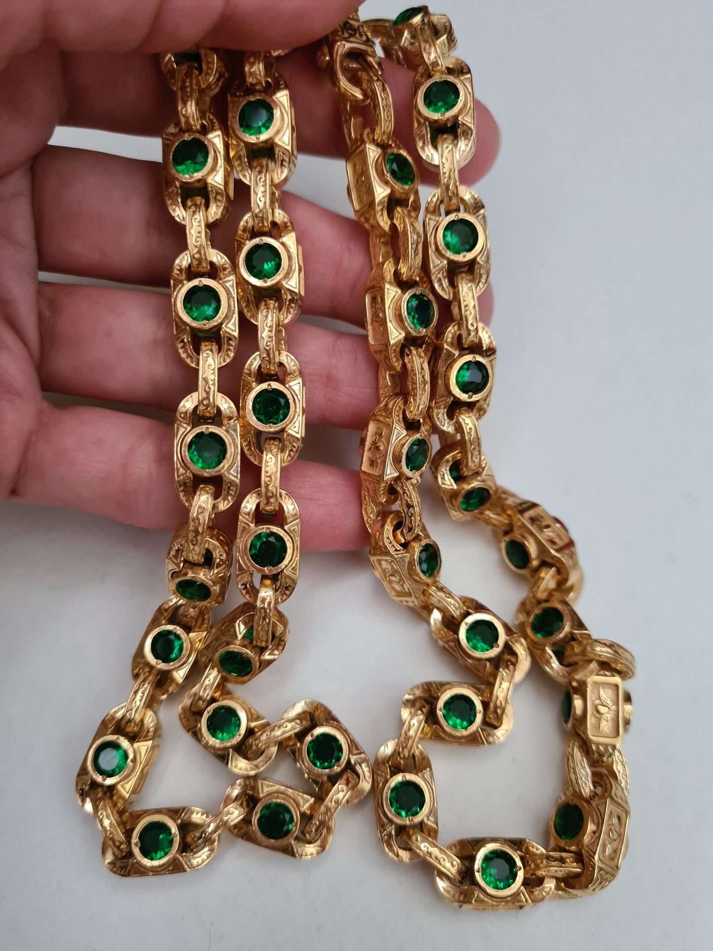 Stylish men’s heavy chain in silver and gold with green stone details