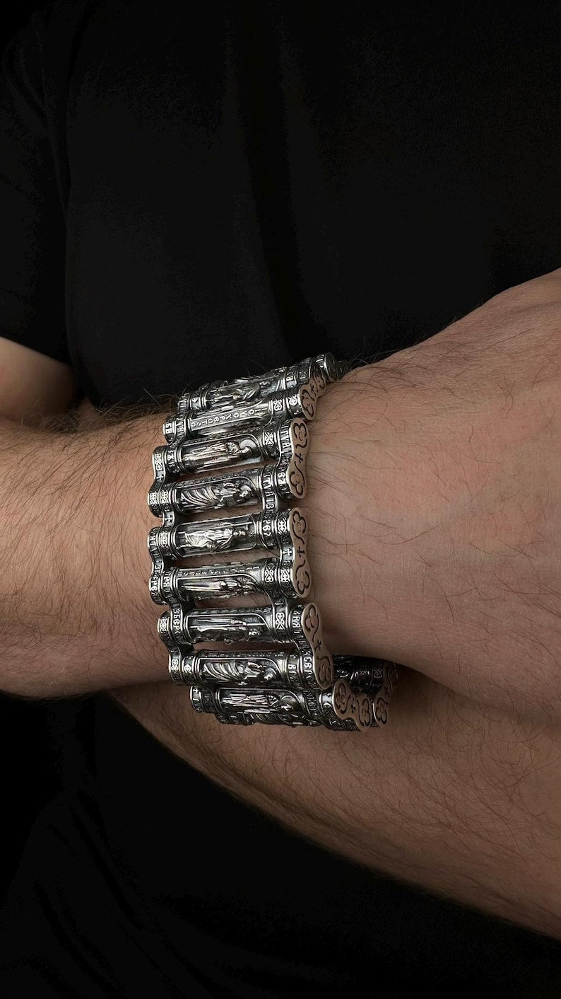 massive men's bracelet made of 925 silver with faces of saints
