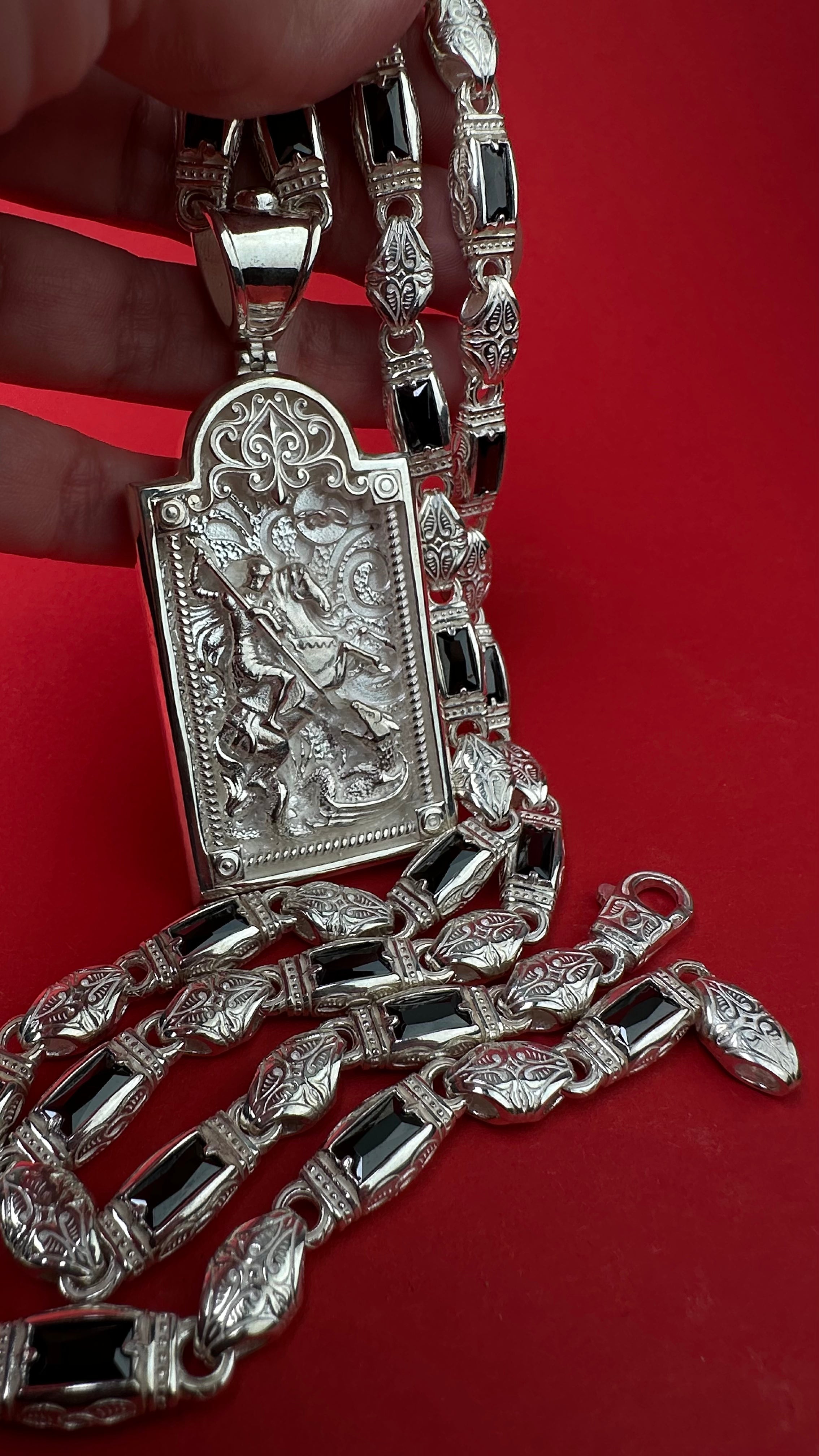 Sterling silver necklace with agate stones and St. George pendant.