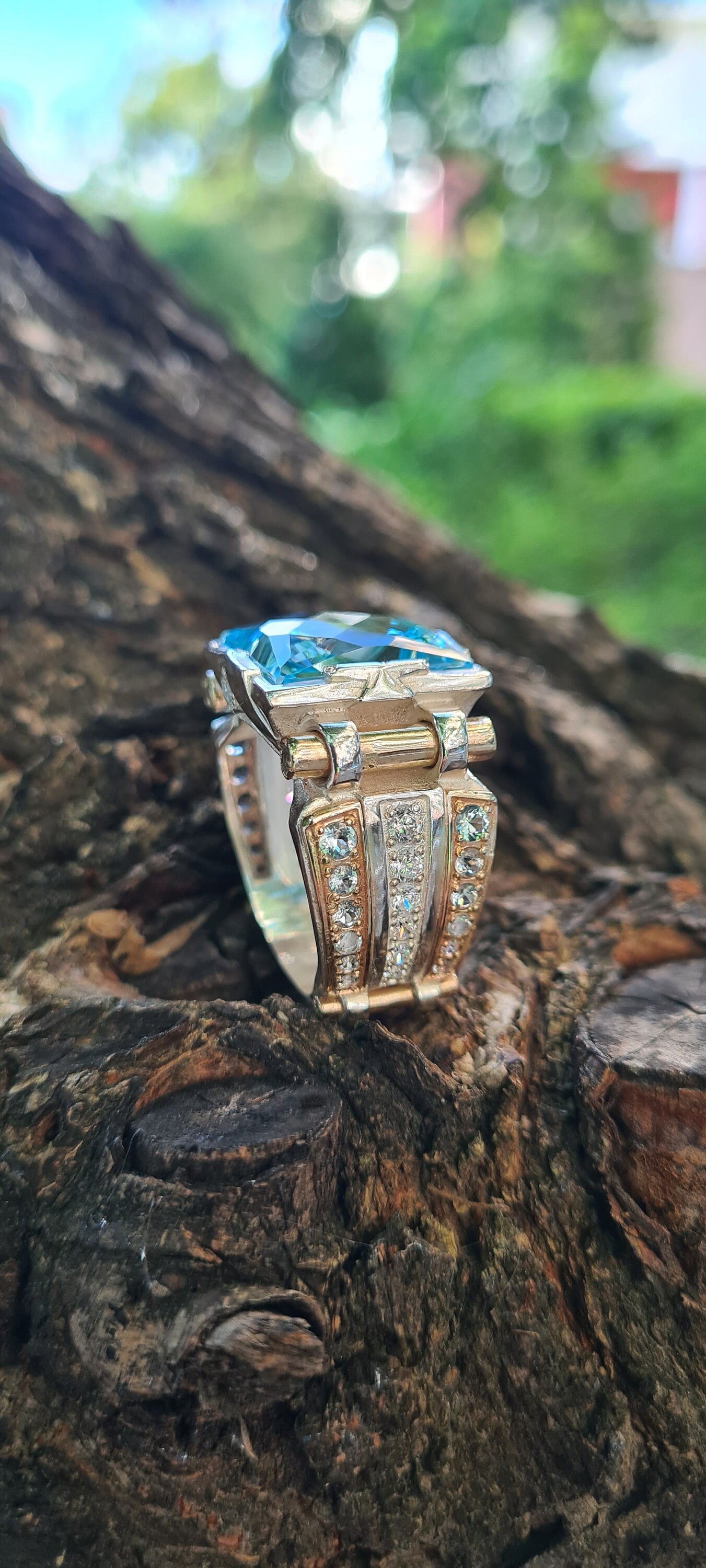 Sterling silver ring with 14K gold overlay and big square blue topaz