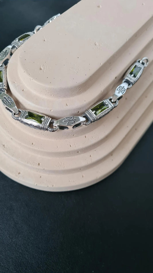 Men’s sterling silver bracelet with Ukrainian trident and peridot