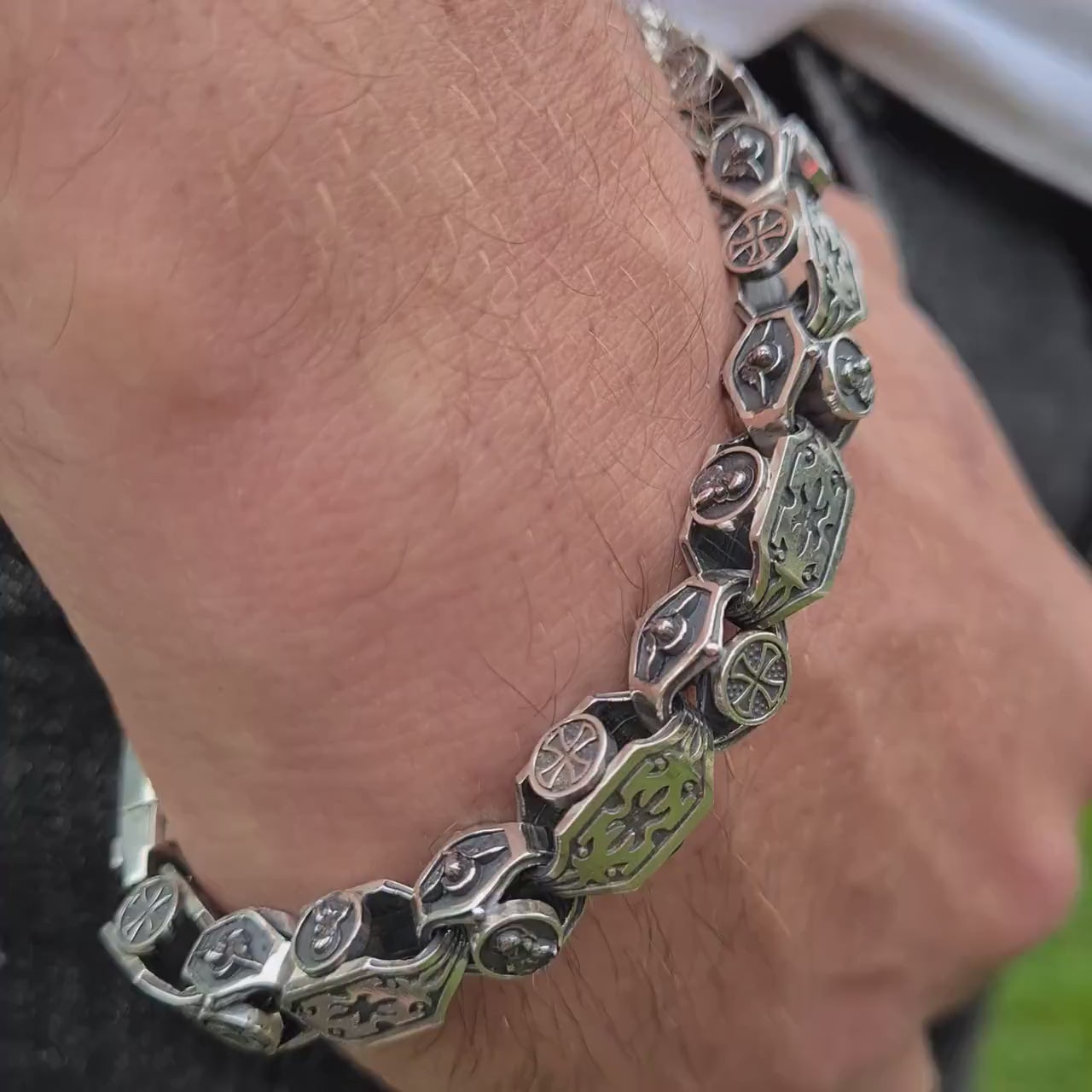 silver jewelry with an engraving of the Virgin Mary