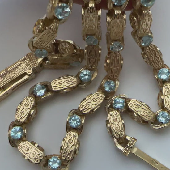 Close-up of 925 silver chain with natural topaz gemstones video
