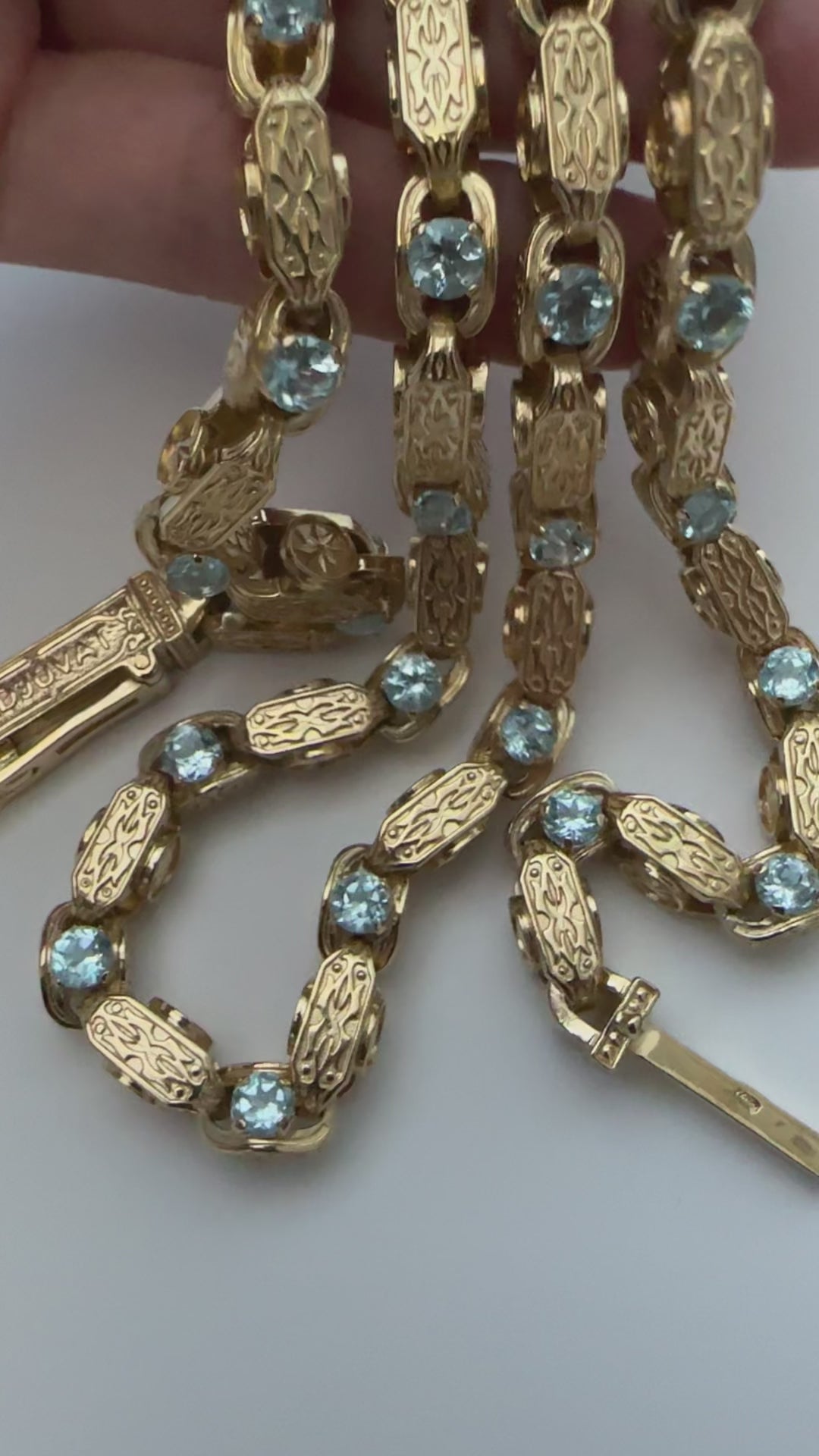 Close-up of 925 silver chain with natural topaz gemstones video