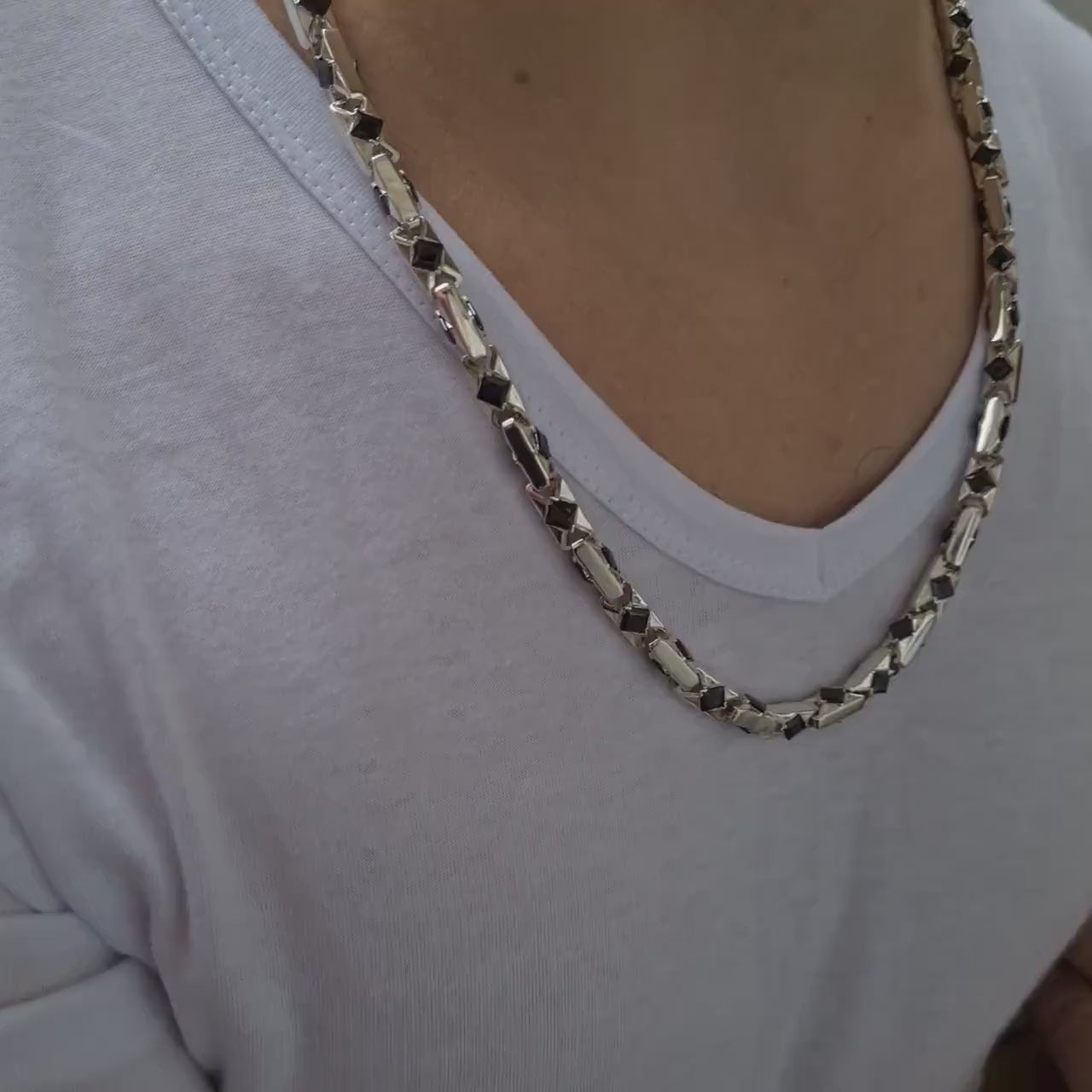 men's silver necklace with agates on a man video
