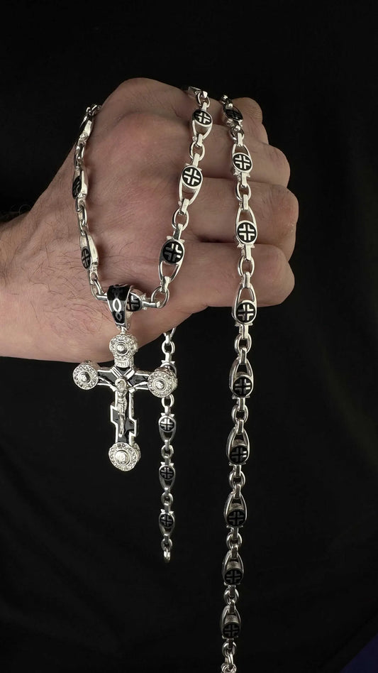Silver cross with black enamel, sparkling stones and crucifix