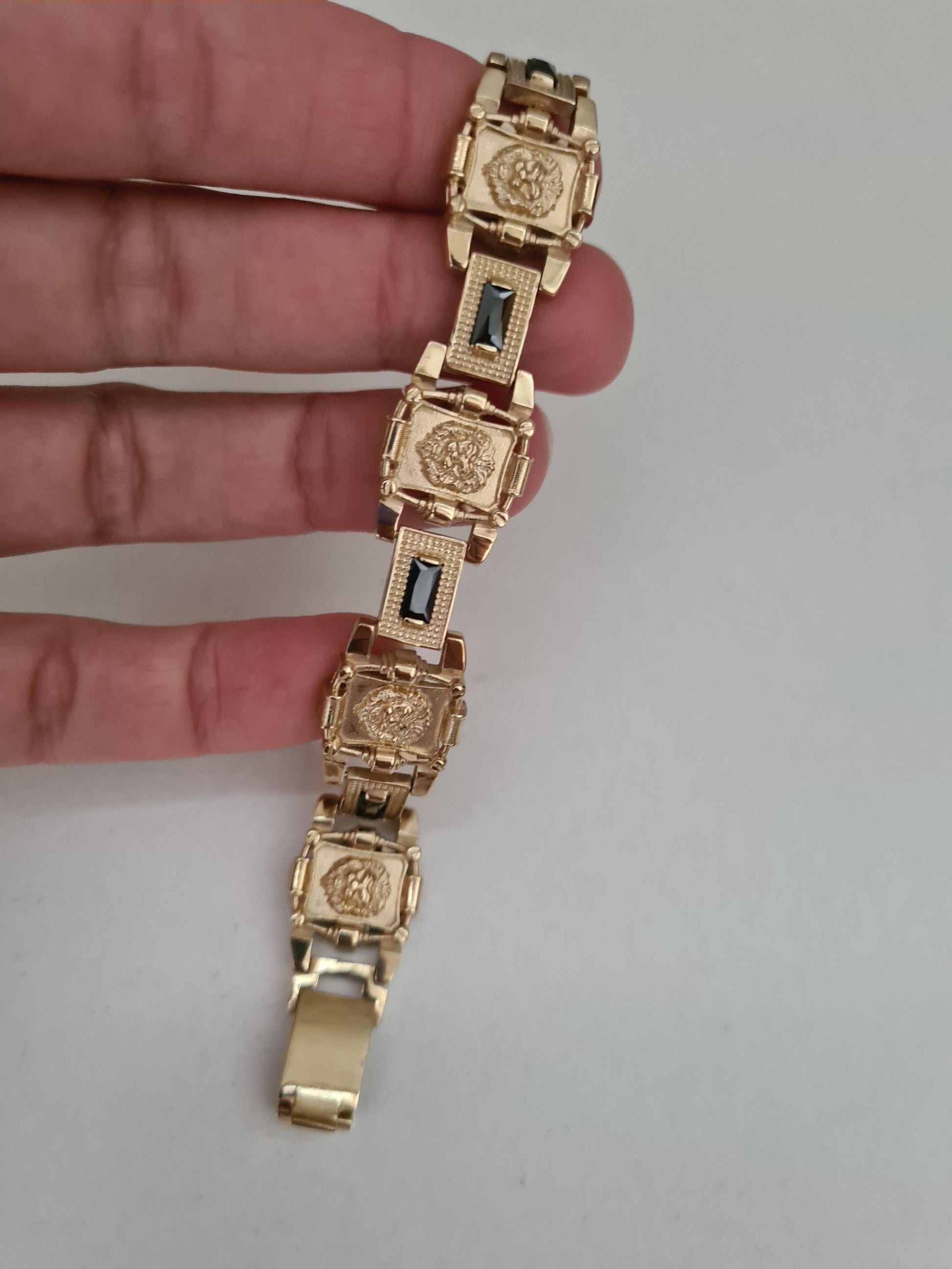 silver bracelet with 18k gold plated lion design