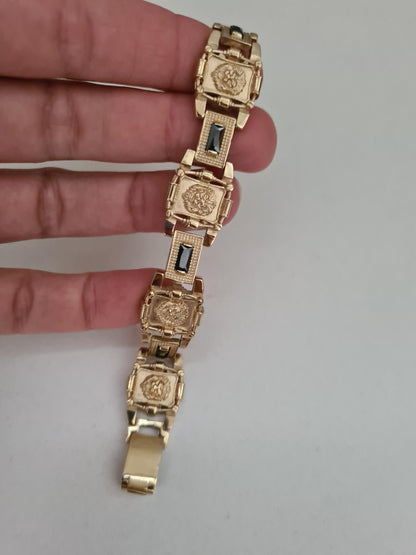 silver bracelet with 18k gold plated lion design