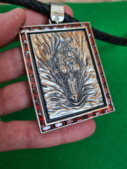 exclusive silver pendant with garnet stones