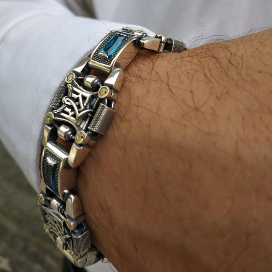 Ukrainian silver bracelet with trident and yellow-blue stones